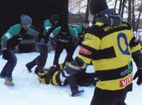 Ogień i rugby na śniegu