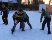 Ogień i rugby na śniegu